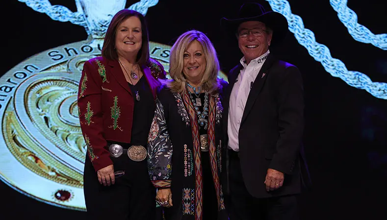 Terri Gay accepts “priceless” Sharon Shoulders Award with her dearly departed friend on her mind
